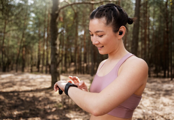 Person wearing smart health monitoring watch